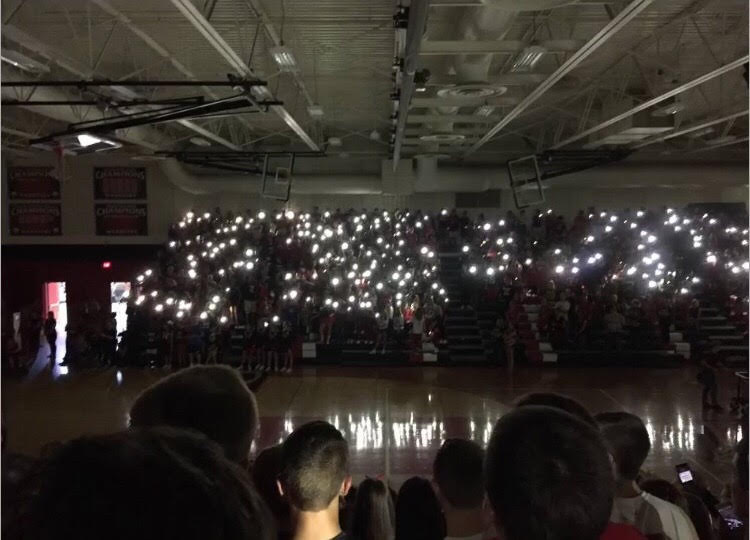 Students pulled out their flashlights to remember the soldiers in our country. 